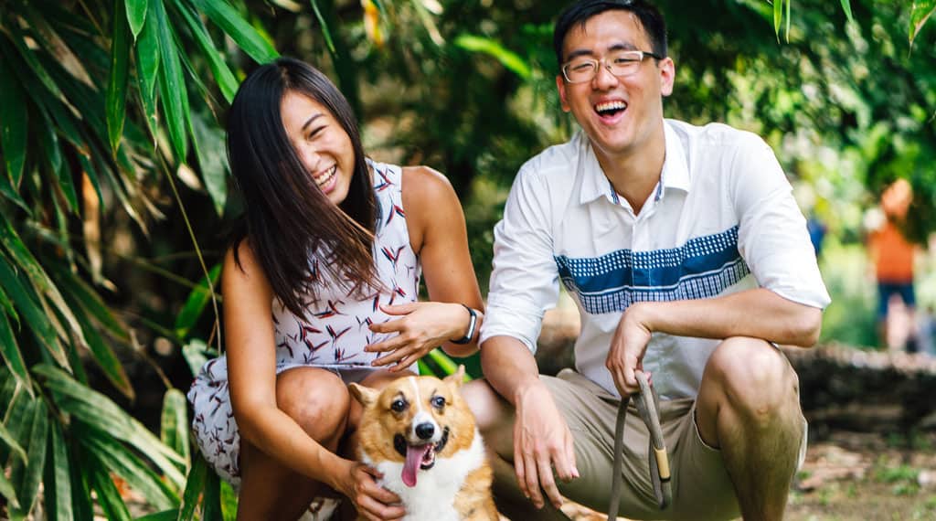 happy couple with dog